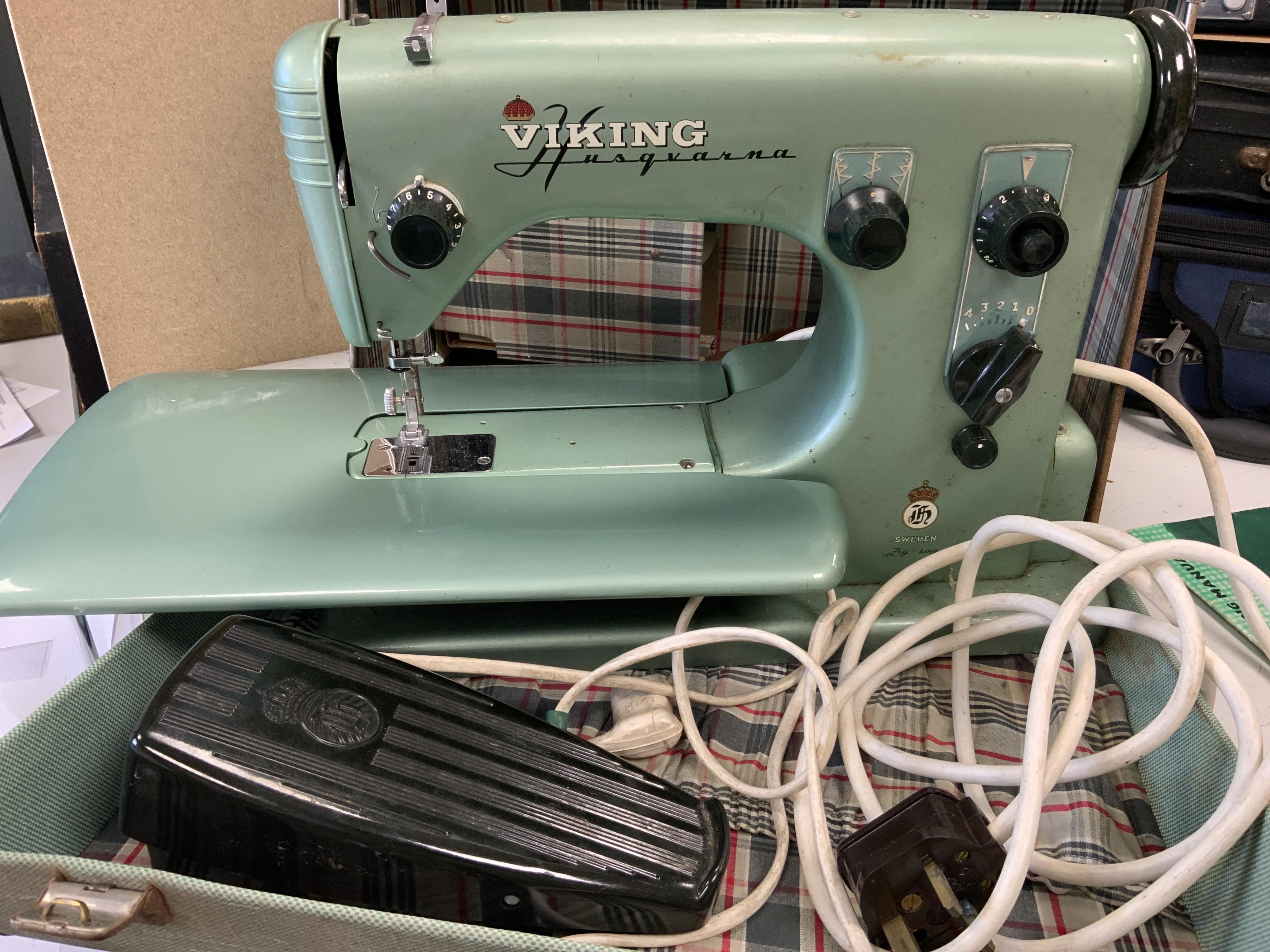 A Swedish 1950s/60s Viking Husqvarna Zig-Zag electric sewing machine, in original fitted case with instruction manual. Condition - fair to good.